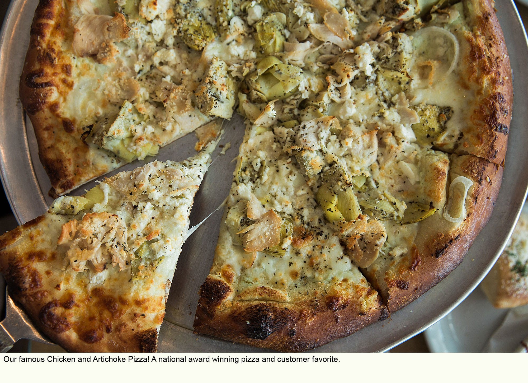 Overhead photo of our National Award Winning Chicken & Artichoke Pizza.